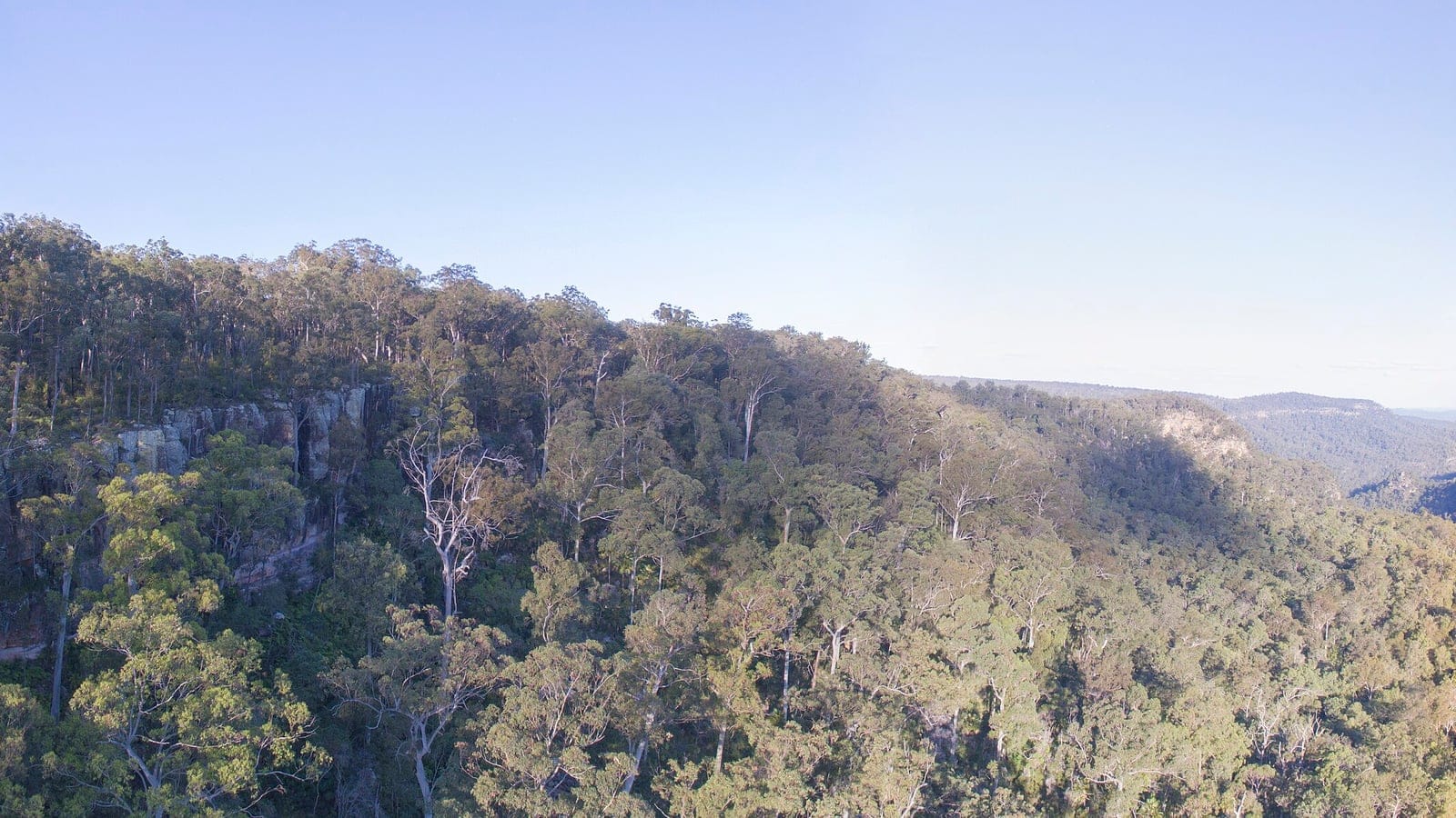 Expansive panoramic landscape view from Mook Mook lookout across the sandstone plateau and ridges of Blackdown Tableland National Park in central Queensland, overlooking the Brigalow Belt country.