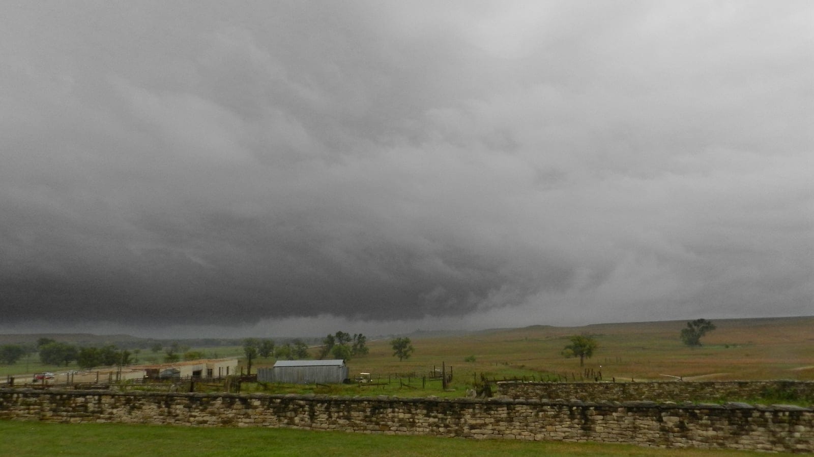 Stormy sky over tallgrass prairie at Tallgrass Prairie National Preserve, Kansas.