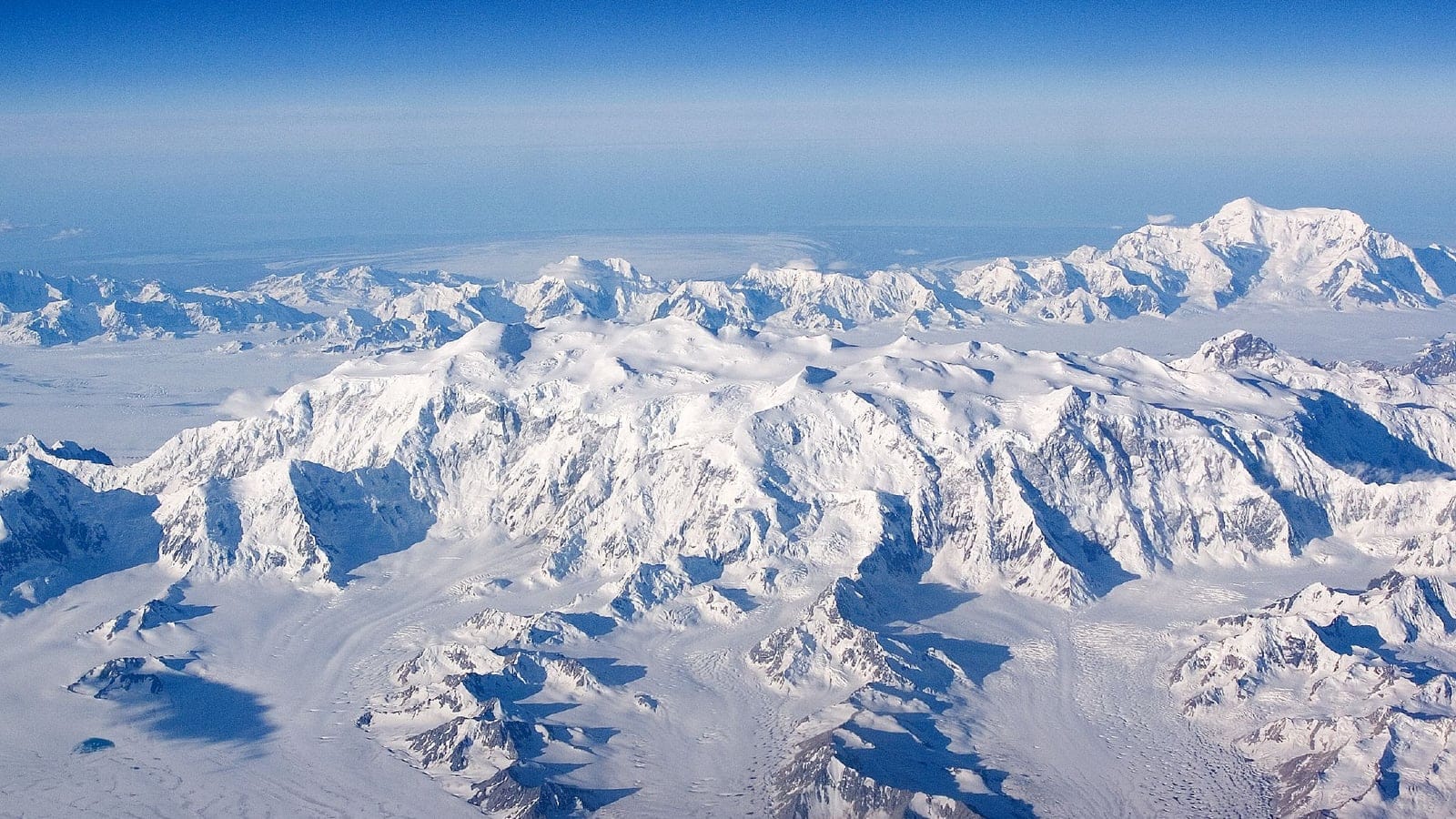 Snow-covered Saint Elias Mountains and glaciers in Alaska.