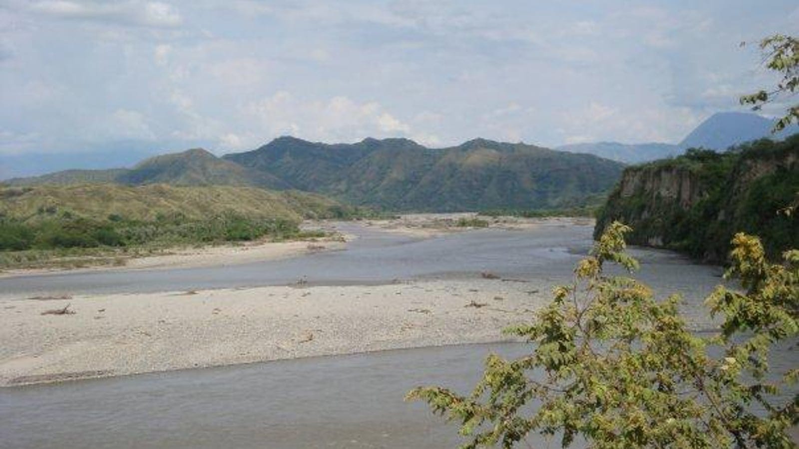 Braided river and sand bars below dry scrub hills in the Patia Valley, Colombia.