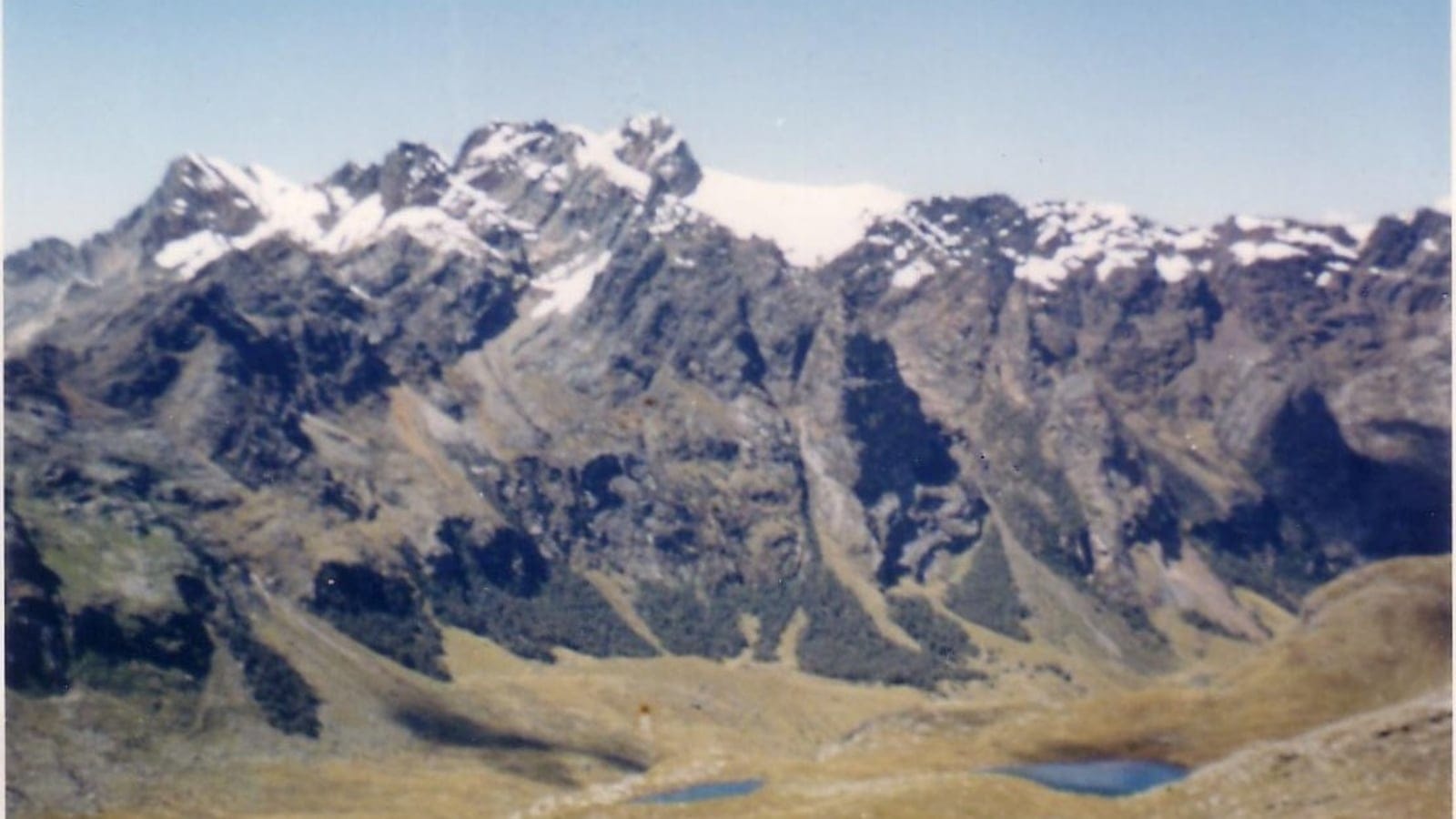 High Andean wet puna grassland, lakes, and peaks near Huascaran.