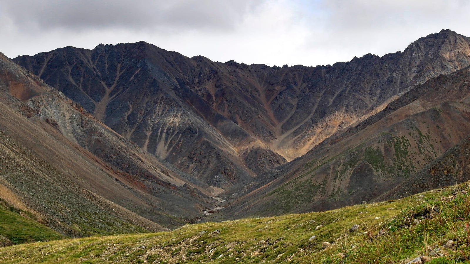 Open mountain tundra valley in the upper Sakhlardakh River region of northeastern Siberia.