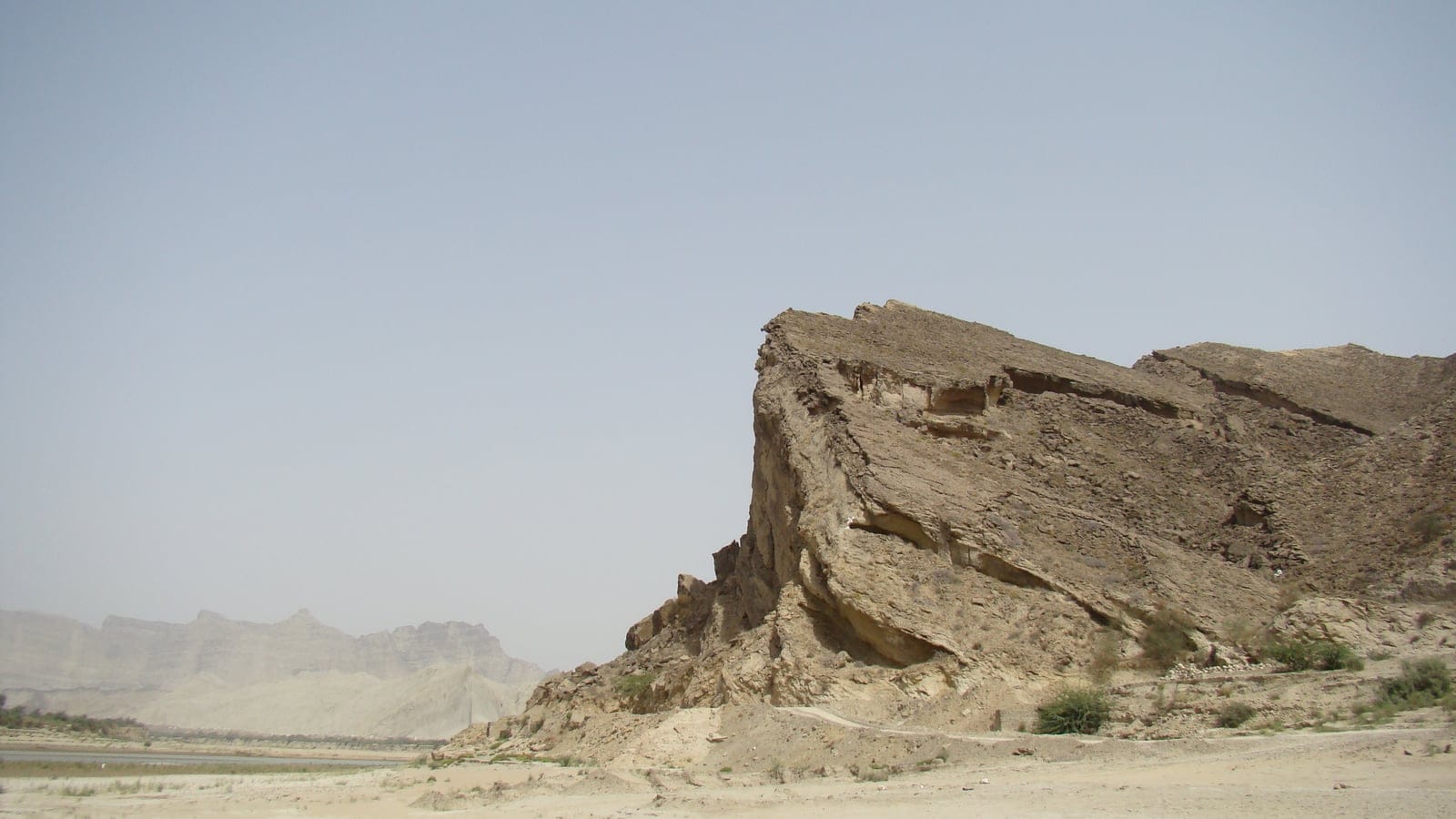 Dry rocky Baluchistan landscape with sparse xeric vegetation in Hingol National Park.